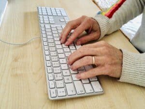 adult-touch-typing-on-keyboard-300x225-8534140